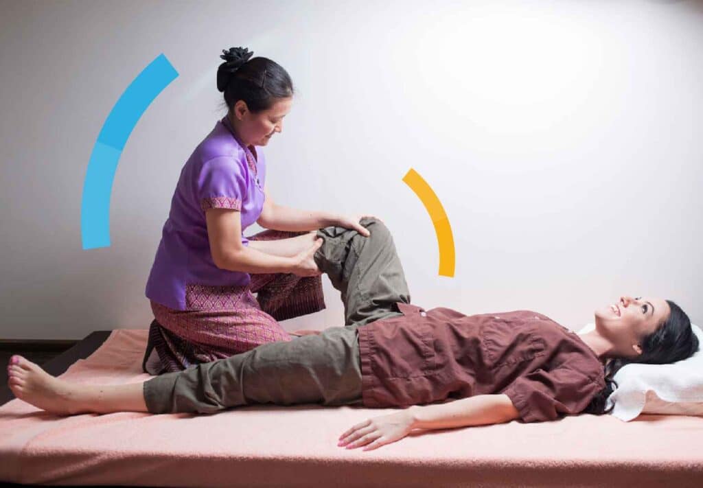 Thai traditional massage leg stretch